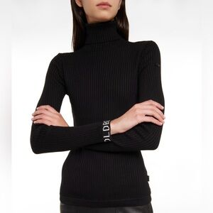 Mira ribbed-knit turtleneck sweater